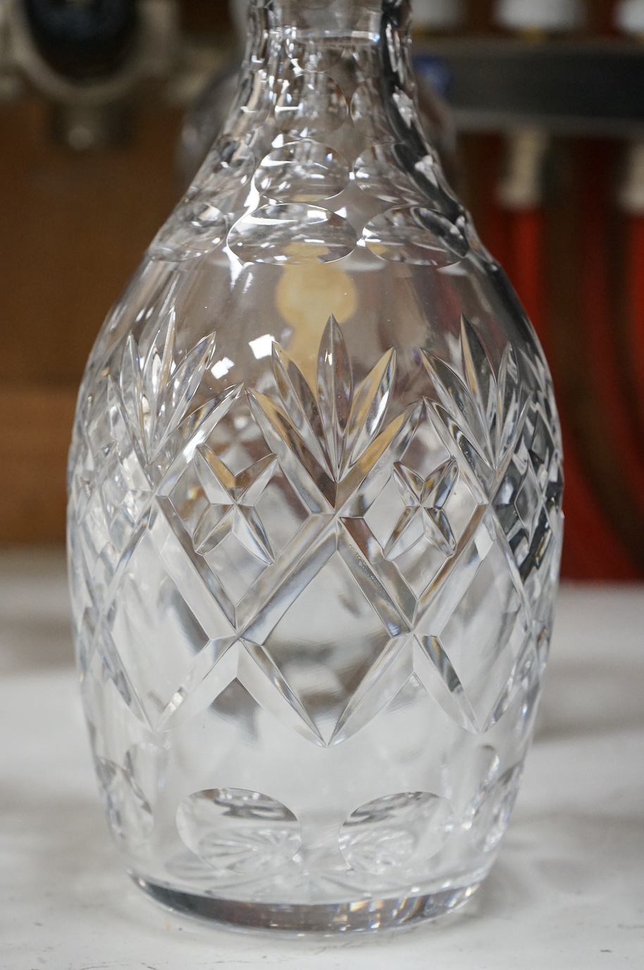 A Webb Corbett bowl, two decanters and another decanter, largest 30cm high
